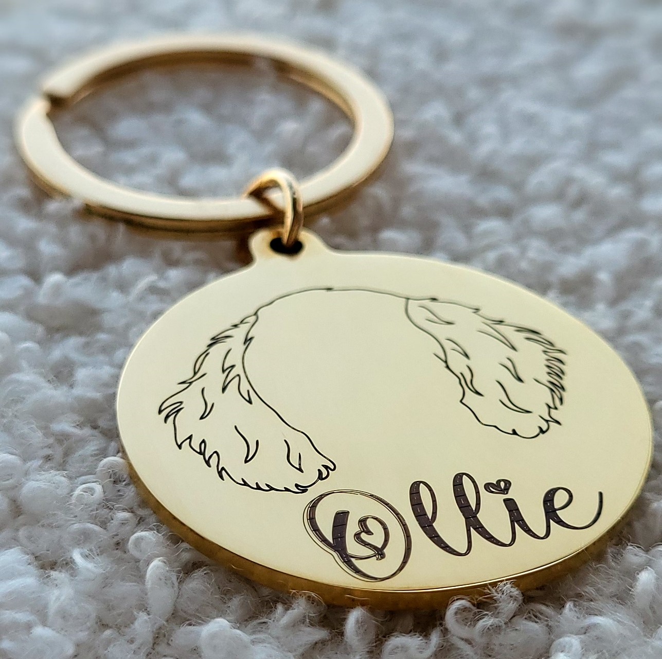 sleutelhanger hondenoortjes goud