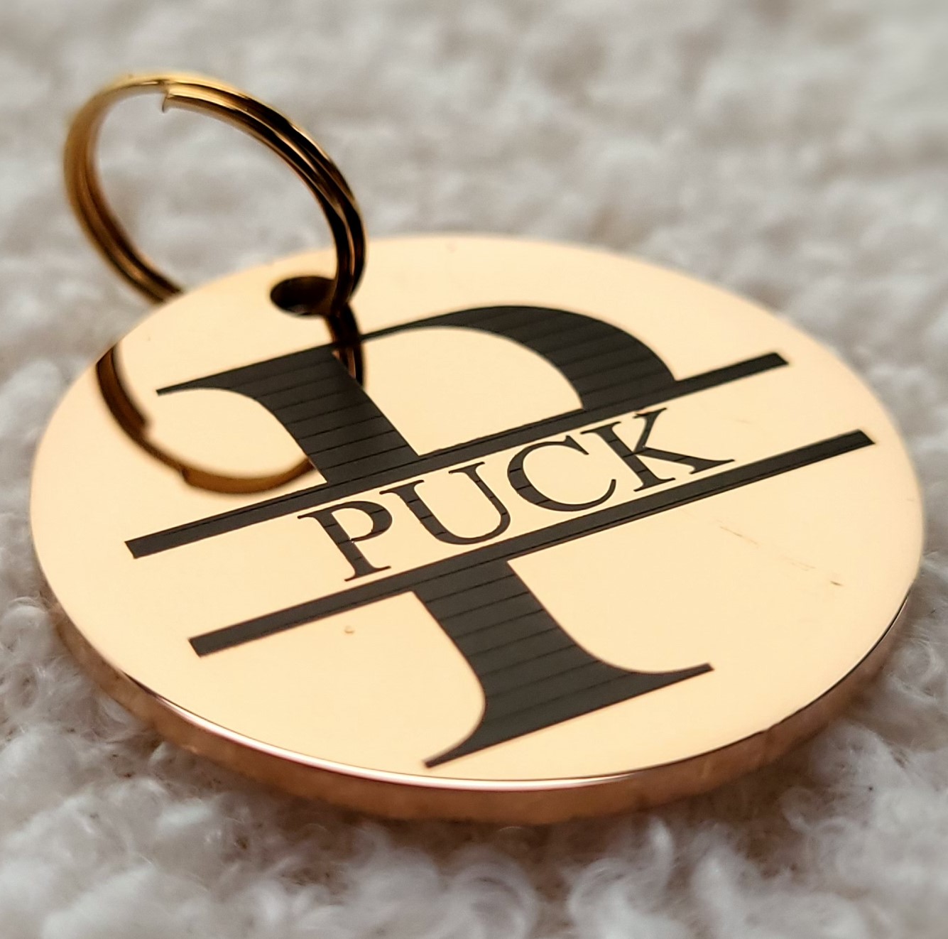 penning rvs monogram rosegoud